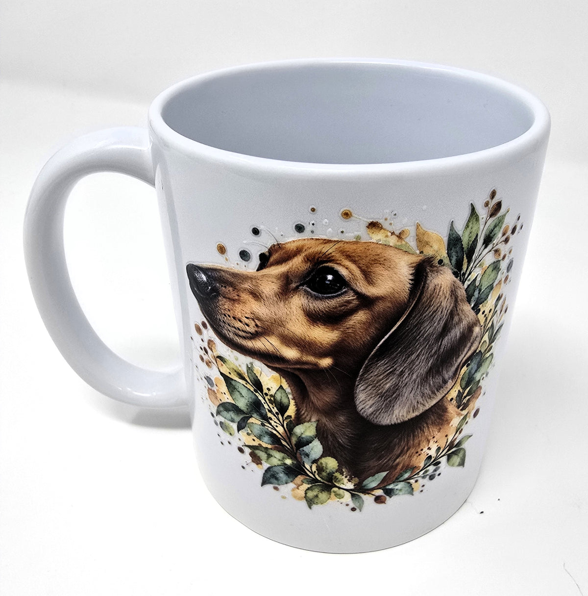 Personalised white ceramic mug featuring a watercolour dachshund pet portrait